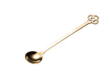 Vintage gold clip spoon